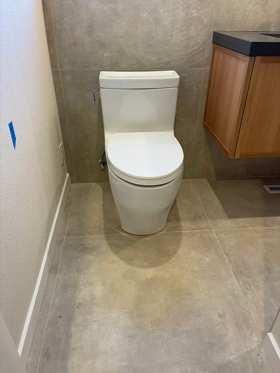Modern toilet installation and drain connection