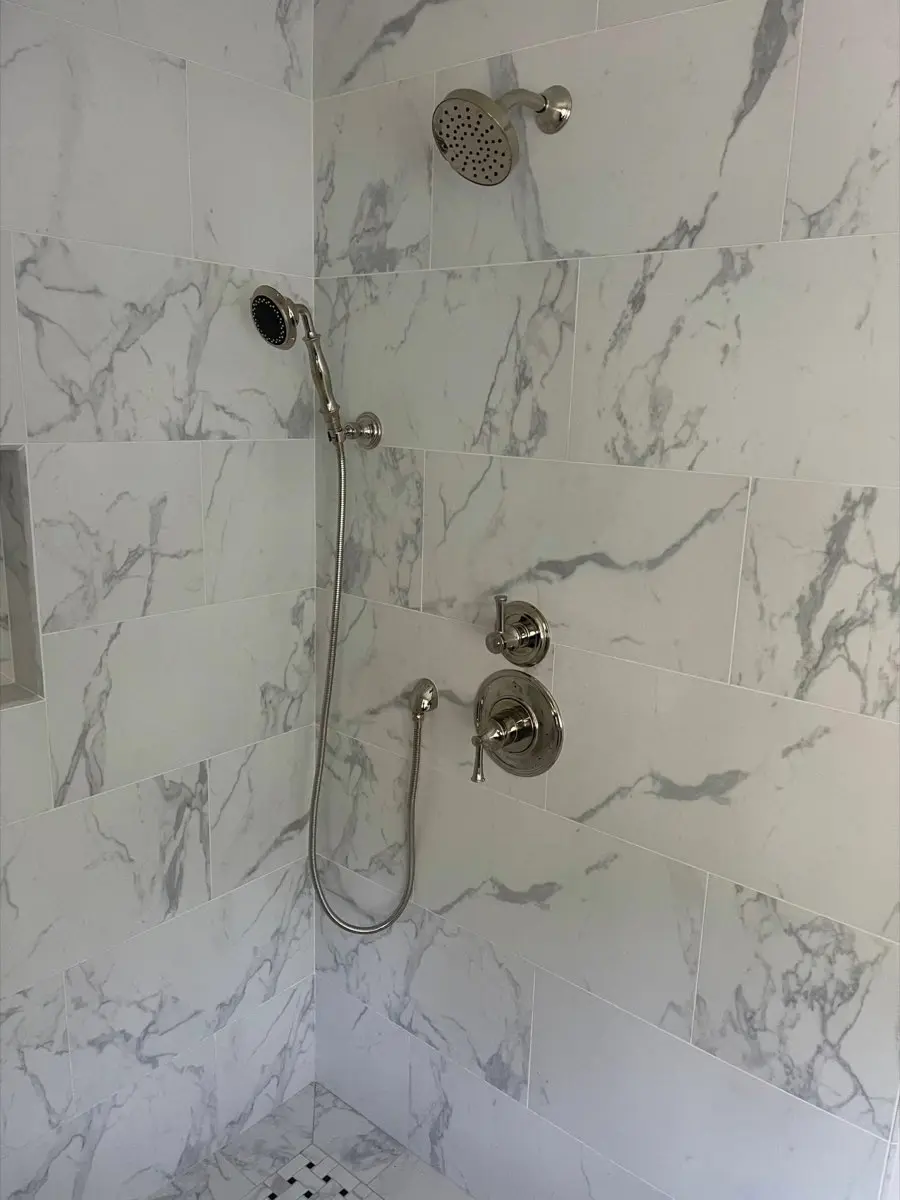 Marble bathroom shower fixture installation