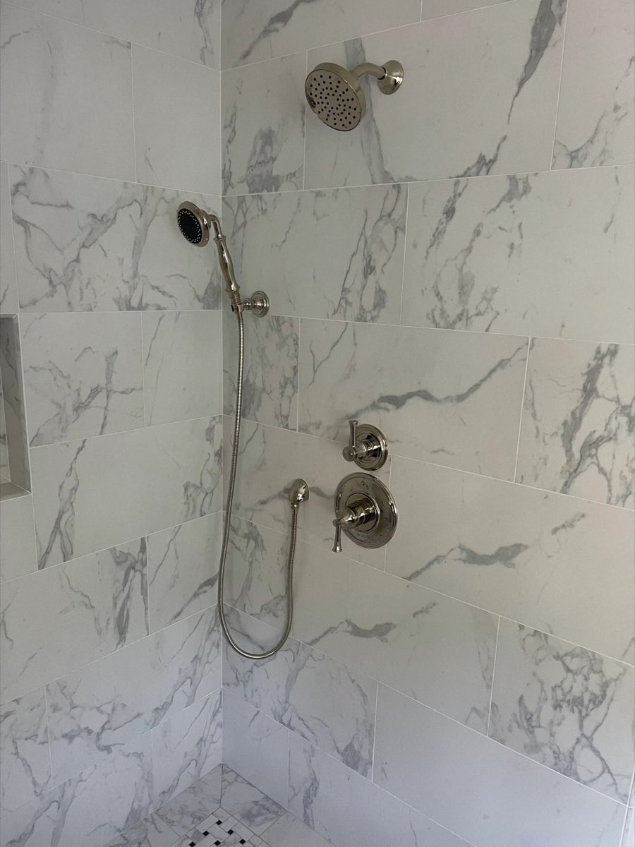 Marble bathroom shower fixture installation